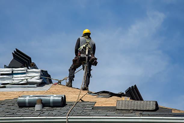 Professional Roof Replacement technician working in Whitman, MA